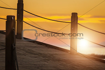 wooden pier at beautiful sunset