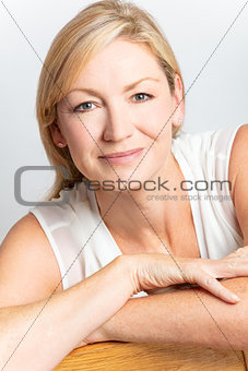 Studio Portrait of Healthy Happy Middle Aged Woman 