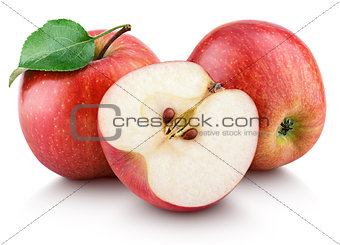 Ripe red apples with half and apple leaf isolated on white