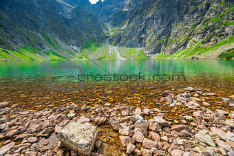 clean water of a cold mountain lake in the Tatras, lake Czarny S