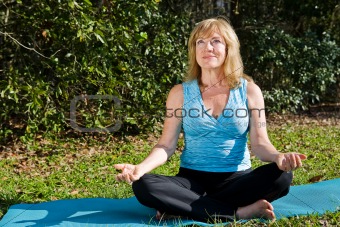 Mature Woman Yoga with Copyspace